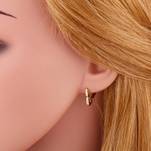 Polished gold heart hoop earrings with simple minimalist geometric drop design