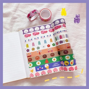 12 rolls of cute Korean style cartoon washi tapes for scrapbooking on a notebook