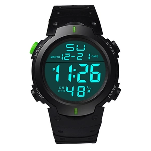 Digital sports watch detail showing green LED backlight and precise calendar display