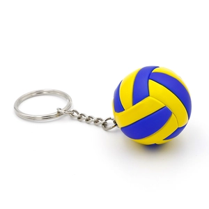Detail showing high-quality yellow and blue volleyball keychain with silver metal ring