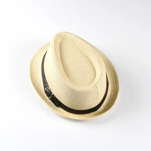 Top view of kids straw jazz hat in beige with black belt and silver buckle detail