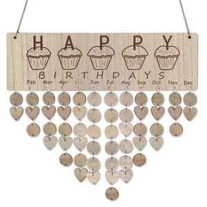 Detailed view of DIY wooden birthday calendar with round and heart-shaped pendants