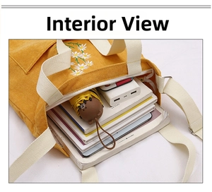 Detail view showing large capacity interior of yellow daisy corduroy tote bag