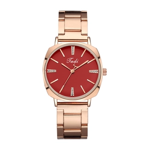 Macro detail of Tadi women's quartz watch with rose gold metal strap and deep red dial