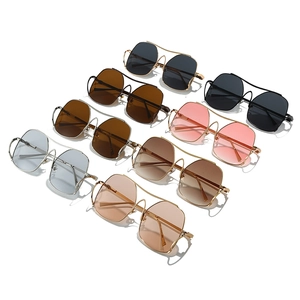 Modern irregular polygonal metal sunglasses for women in various colors with UV protection