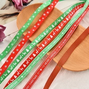 Christmas themed grosgrain ribbons with snowflakes and reindeer for festive gift wrapping