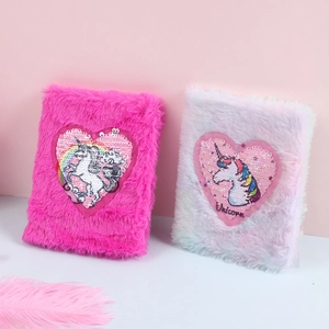 Furry unicorn notebooks in rose red and rainbow tie-dye with sequin heart detail