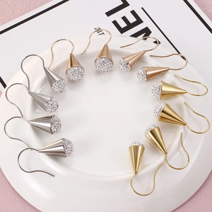 Cone-shaped stud earrings in silver, gold, and rose gold with pave crystal settings