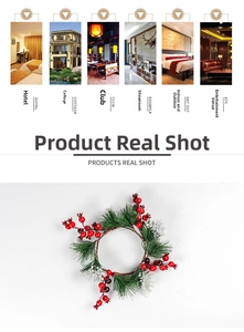 Detailed view of Christmas candle ring with red berries, pine needles and snow spray finish