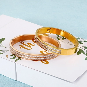 Fashionable gold and rose gold bangles with double-row sparkling crystal inlay set