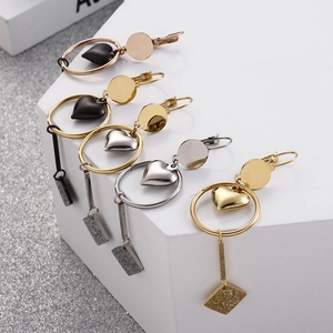 Minimalist geometric heart earrings with long bars in gold, silver and rose gold
