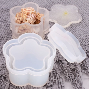 Detail of flower-shaped silicone molds for resin storage boxes with lids and shell fillers