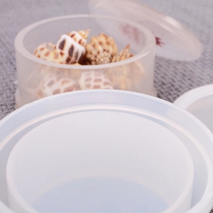 Macro shot of circular silicone resin mold with lid for handmade jewelry storage box