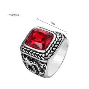 Macro shot of retro dragon ring with red square gemstone and 18mm width detail