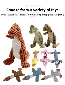 Detail of plush squeaky dog toys in dinosaur and animal shapes with corduroy texture