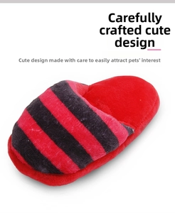 Detail of red and black striped plush slipper dog toy with soft textured fabric surface