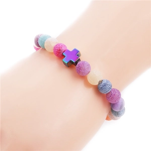Colorful weathered agate stone bead bracelet with a purple cross charm and dumbbell pendant