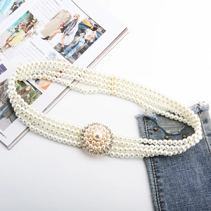 Elastic four-row pearl waist belt with gold round buckle and crystal accents