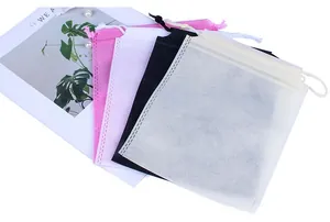 Detail of four-color non-woven drawstring bags with heat-pressed edges for storage