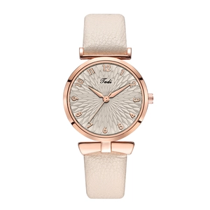 Detailed close-up of Tadi quartz watch with beige leather strap and rose gold textured dial