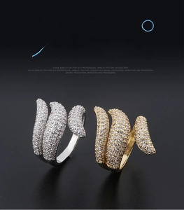 Detail of adjustable open rings with micro-set white zircon and twisted stream design