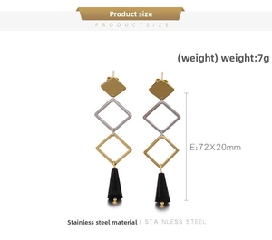 Detail view of long geometric earrings with stainless steel frames and black cone charms
