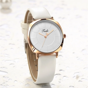 Close-up of Tadi minimalist white leather watch with rose gold square case for women