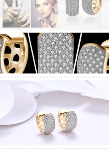 Detailed close-up of gold-plated hoop earrings with micro-pave white zirconia crystals