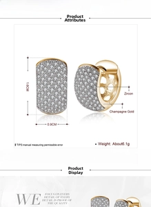Detail view showing dimensions of champagne gold zircon hoop earrings 1.6cm x 0.9cm