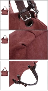 Close-up of canvas texture, dark brown webbing straps and silver metal rings on a tote bag