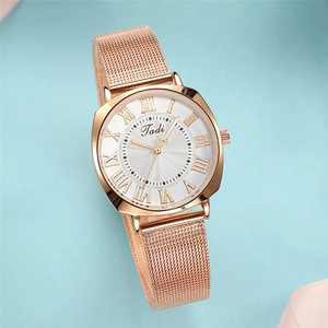 Elegant rose gold women's quartz watch with mesh strap and Roman numeral dial