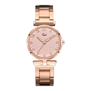Detailed macro view of the rose gold dial with radial floral pattern and Arabic numerals