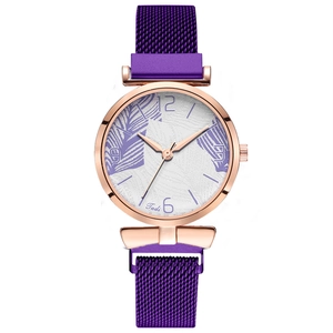 Elegant ladies quartz watch with purple magnetic strap and leaf pattern dial detail