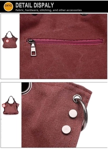 Detail view of burgundy canvas tote bag showing durable zippers and reinforced stitching