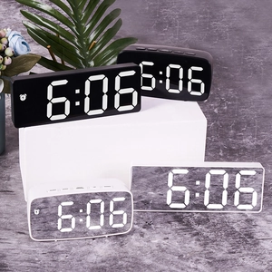 Digital LED mirror alarm clock set in black and white marble finish for home decor