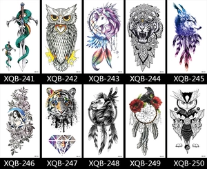 Detail view of 10 animal tattoo designs including tiger, wolf, and floral patterns