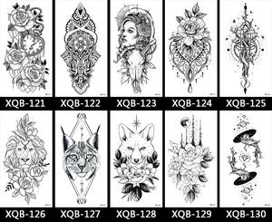 Detailed catalog of black and white flower and animal temporary tattoos on white background