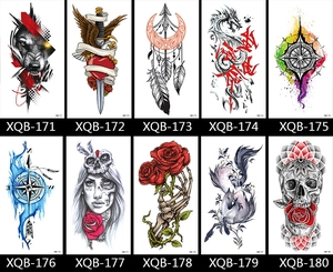 Collection of temporary tattoo stickers featuring floral, dragon, and wolf designs