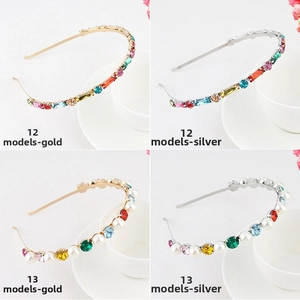 Detailed view of rhinestone headband sets with pearls and crystals in gold and silver finishes