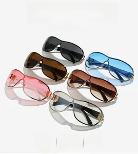 Detailed selection of rimless oversized sunglasses with metal rivets in various colors
