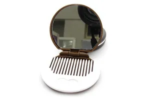 Mini chocolate cookie folding makeup mirror with an integrated hair comb inside