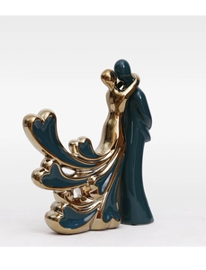 Detail of Morandi dark green and gold plated ceramic sculpture with hollow heart design