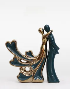 Macro detail of abstract ceramic figurine with polished gold and emerald green glaze finish