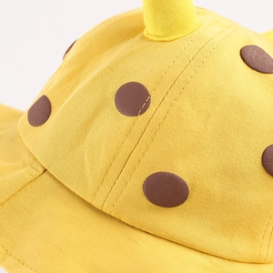 Cute yellow kids sun hat with brown polka dots and cartoon 3D animal decorative horns