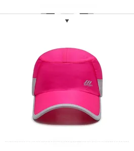 Detail of rose pink baseball cap with grey mesh vents and quick-dry polyester fabric