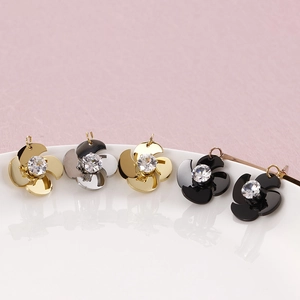 Elegante Windrad Blumenohrstecker mit Zirkon in Gold, Silber und Schwarz Ausführung