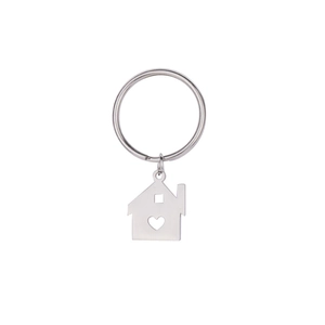 Close-up of a silver stainless steel house-shaped keychain with a heart cutout detail