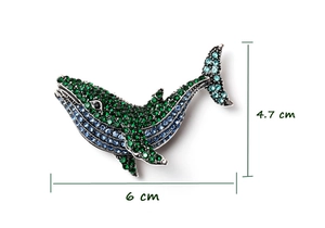 Detail view of rhinestone whale brooch with blue and green gradients showing 6cm x 4.7cm size