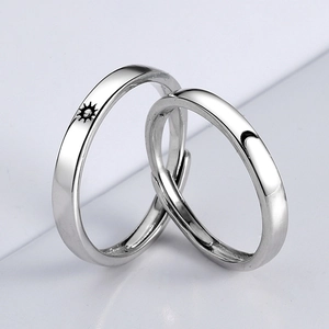 Minimalist silver sun and moon couple rings with adjustable open band design
