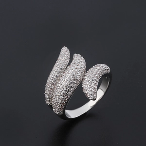 Silver triple curved open ring featuring micro-pave sparkling cubic zirconia on black background